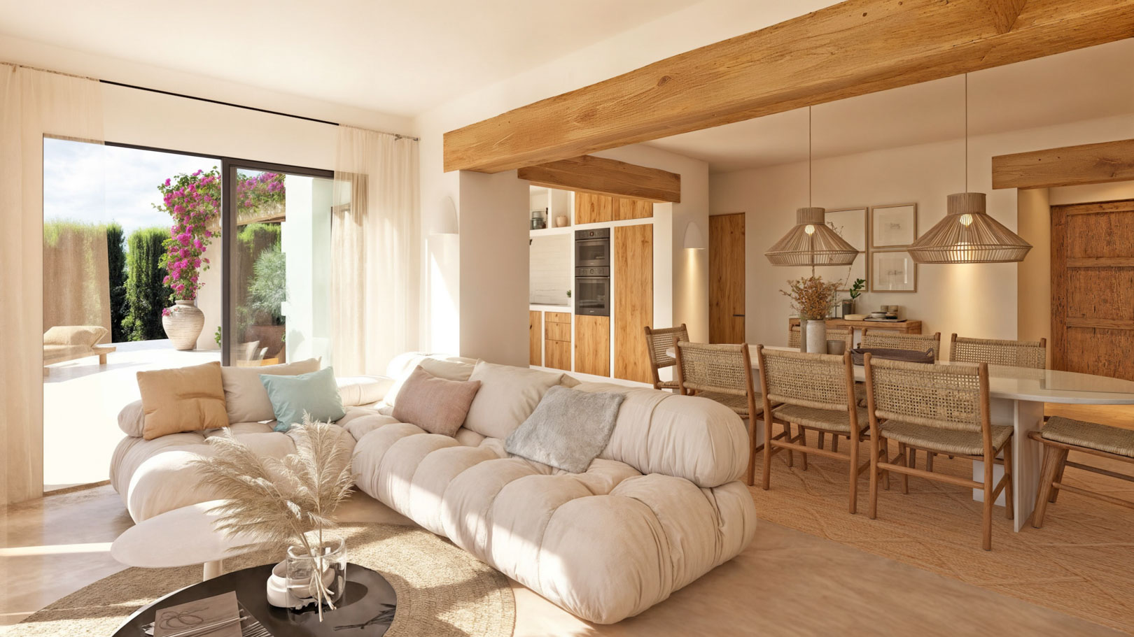 Salón-comedor diáfano con vigas de madera vista, mobiliario de fibras naturales y acceso directo a la terraza mediante grandes ventanales de suelo a techo.