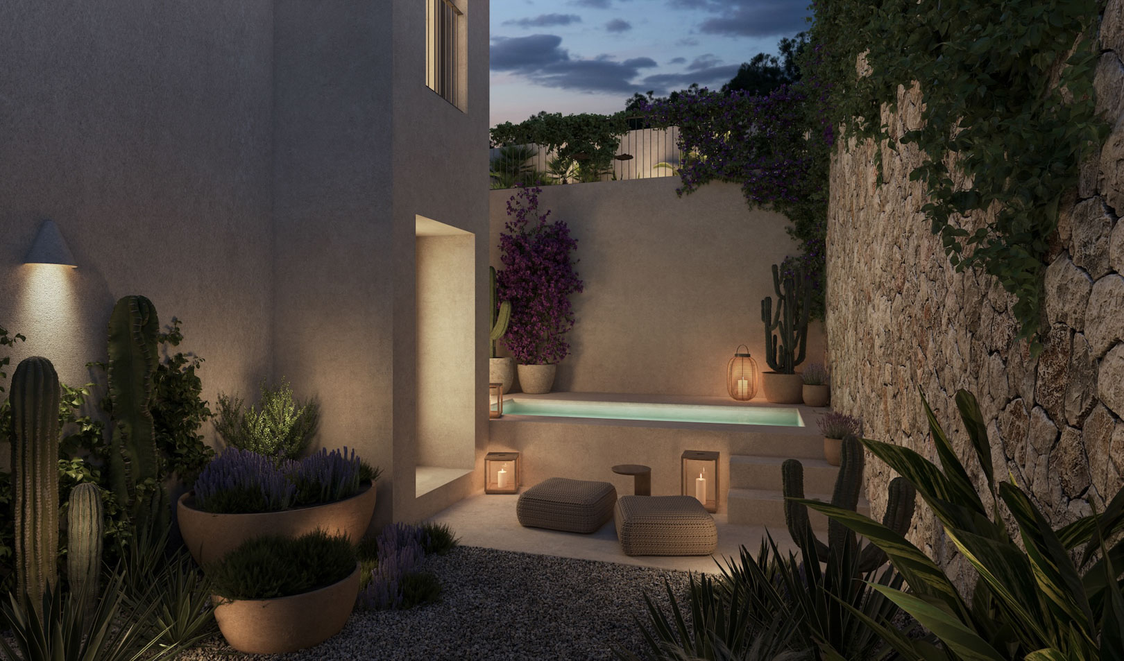 Zona de bienestar exterior con piscina de inmersión, muros de piedra natural y vegetación mediterránea iluminada por faroles y luces integradas.