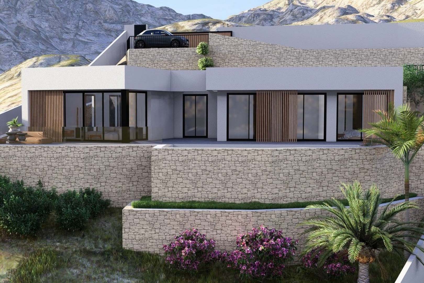Fachada de diseño moderno con muros de piedra natural, lamas de madera y amplios ventanales, integrada en la ladera con vistas a la montaña y aparcamiento superior.