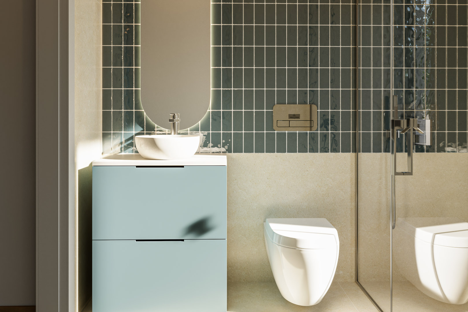 Baño moderno con azulejos verticales en tono verde azulado, mueble suspendido azul pastel con lavabo sobre encimera y espejo ovalado retroiluminado.
