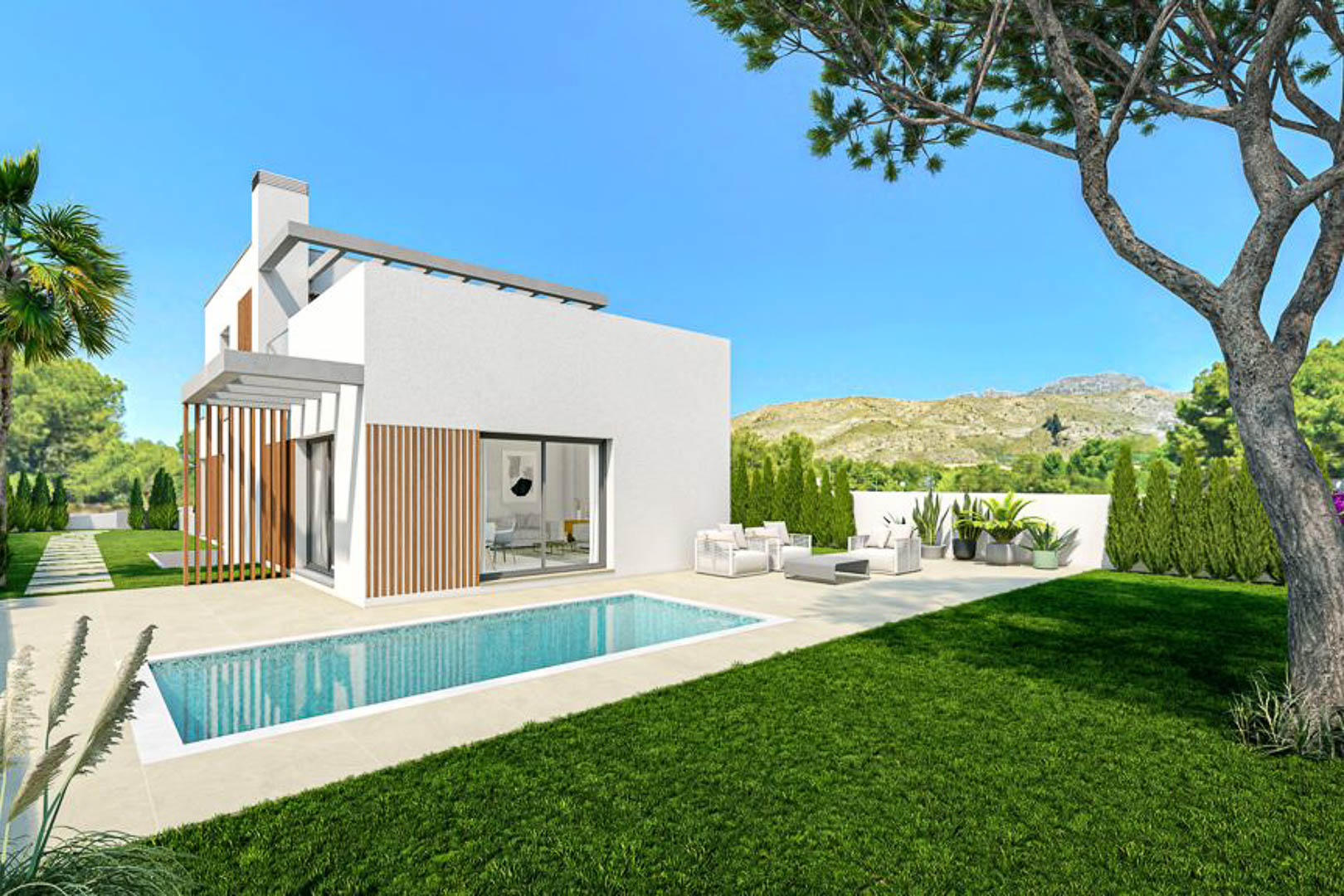 Exterior de villa moderna con piscina privada, zona de césped y terraza de gres porcelánico. Fachada blanca con detalles de lamas de madera y vistas a la montaña.