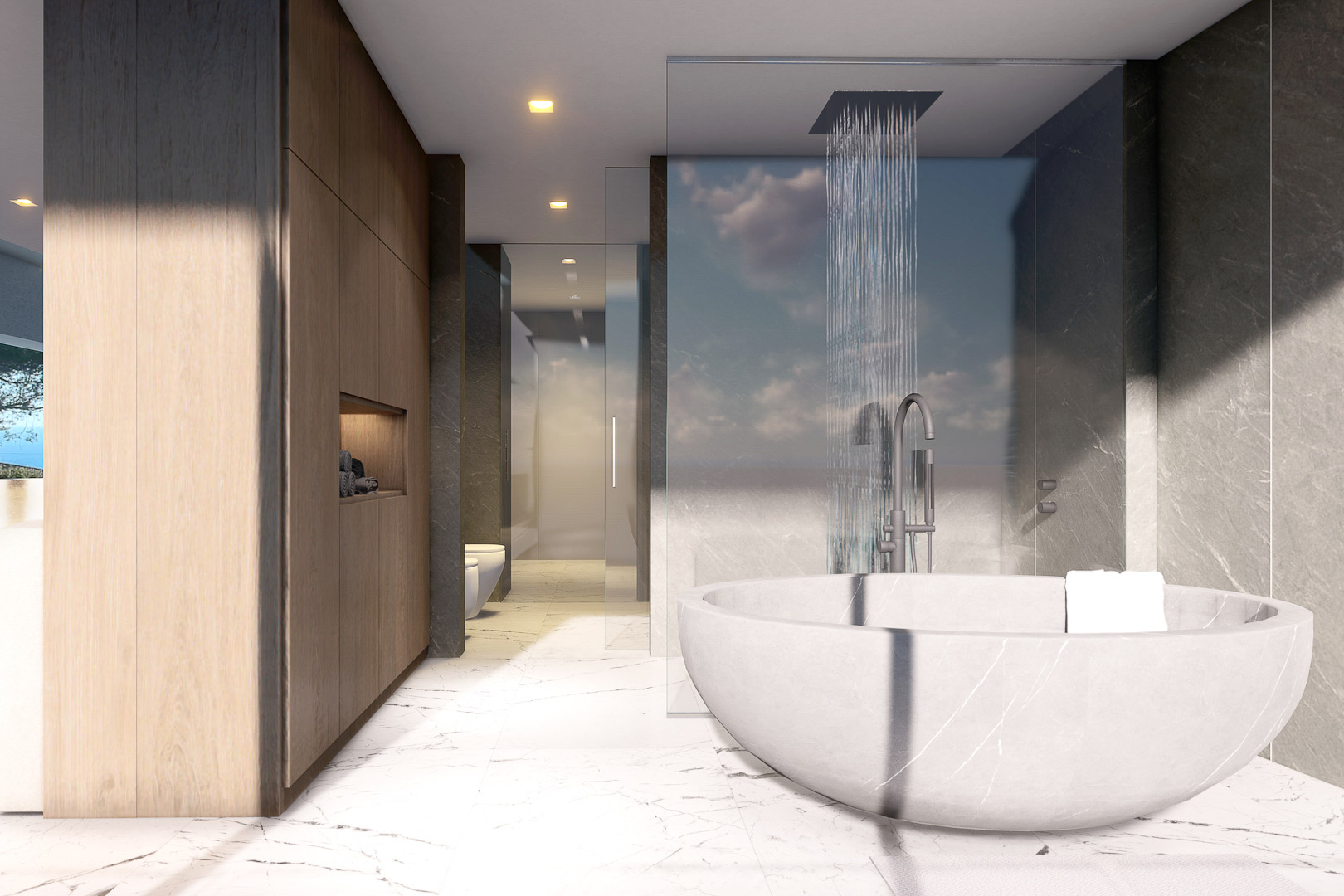 Detalle de baño moderno con bañera de mármol y ducha efecto lluvia.
