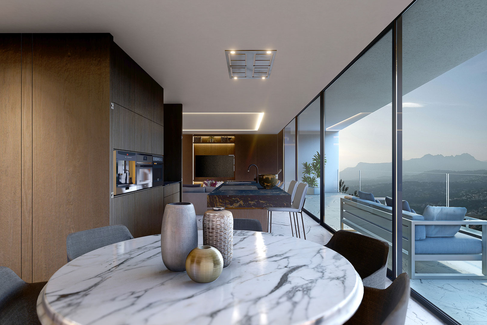 Detalle del comedor con cocina abierta y vistas panorámicas al exterior.