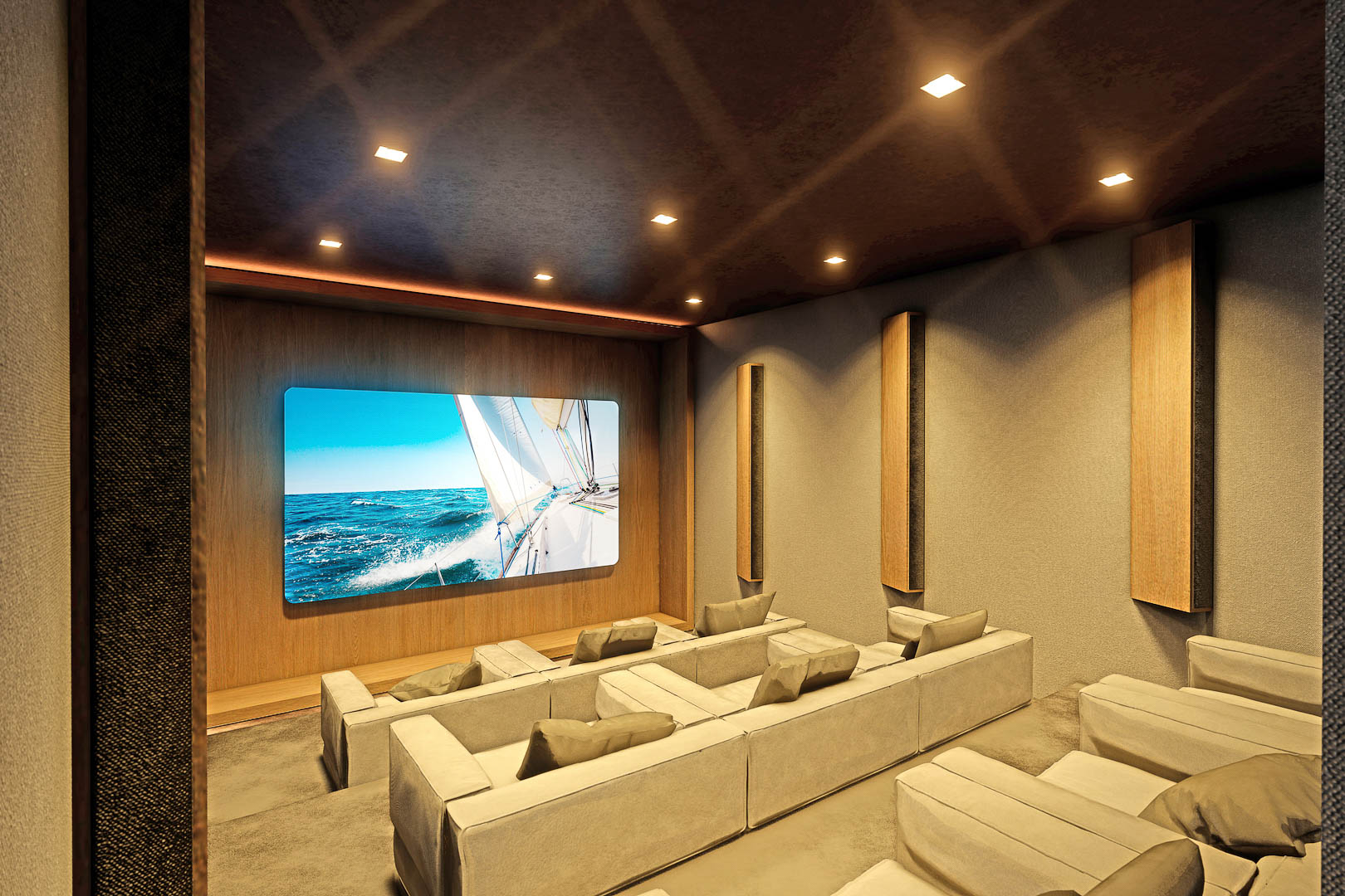 Sala de cine en casa con sofás modulares y pantalla con imagen de velero.