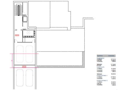 Plano arquitectónico detallado de la planta baja con garaje doble, escalera y distribución de espacios.