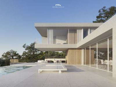 Vista exterior de la villa con piscina infinita y terraza solárium con tumbonas blancas.