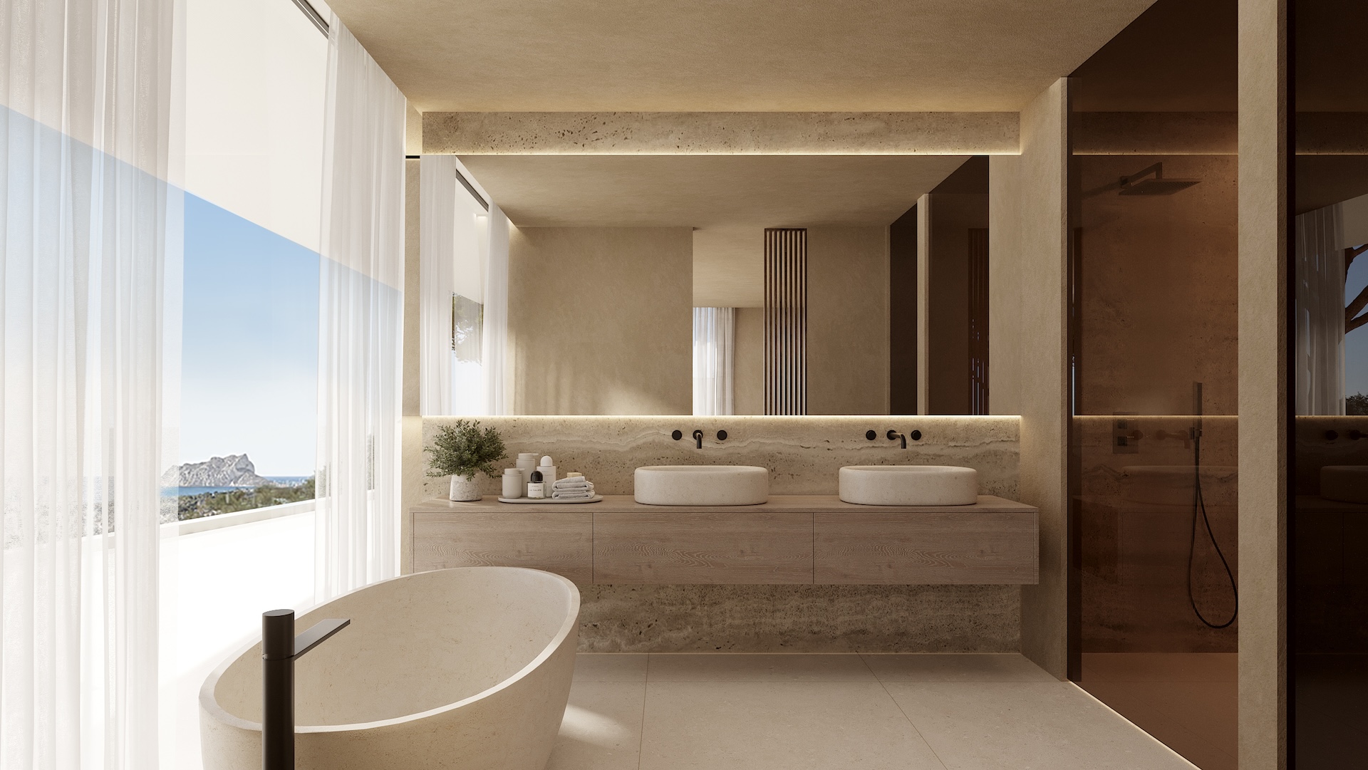 Baño principal con bañera de piedra exenta, doble lavabo y vistas panorámicas al mar a través de amplios ventanales. Baño principal con bañera de piedra exenta, doble lavabo y vistas panorámicas al mar a través de amplios ventanales.