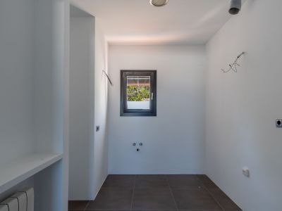 Villa de estilo mediterráneo en venta en Moraira con vistas panorámicas al mar.