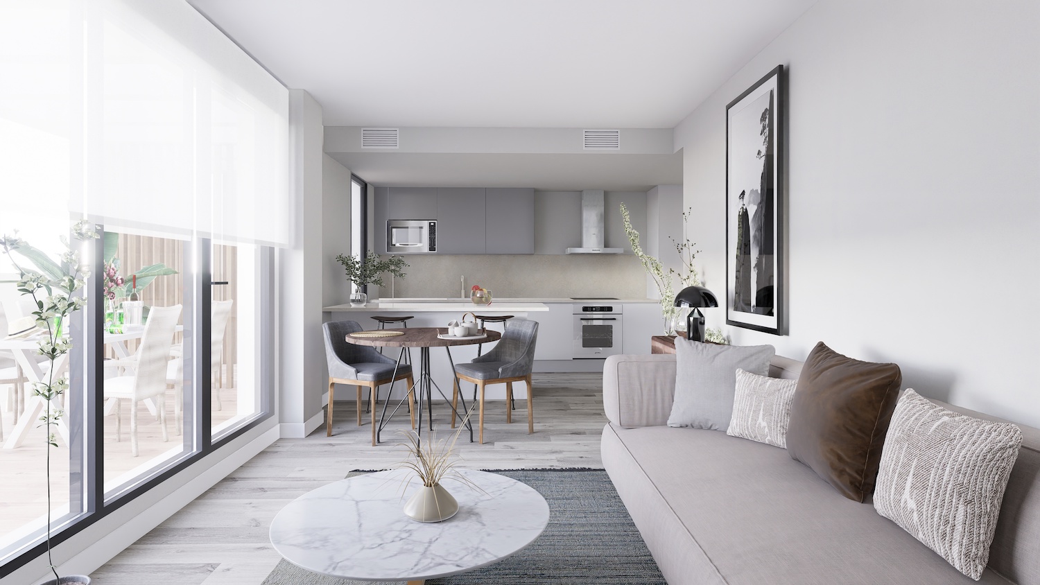 Salón-cocina de concepto abierto con sofá claro, mesa de centro de mármol y cocina compacta con armarios grises y electrodomésticos. Puertas acristaladas conectan con una terraza exterior.