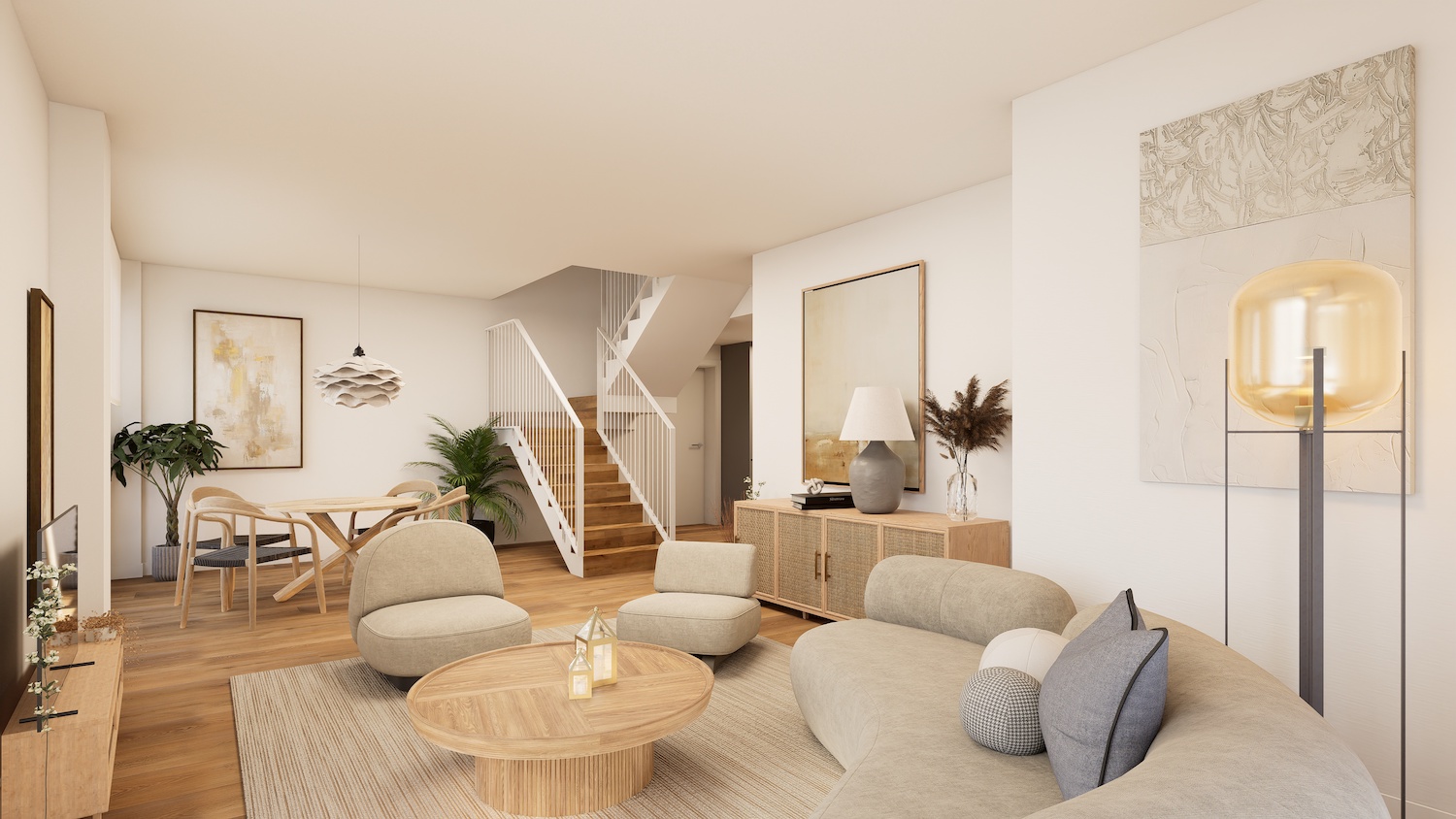 Salón-comedor de planta abierta con sofá curvo, dos sillones y mesa de centro de madera redonda sobre alfombra. Escalera moderna de madera con barandilla blanca conecta los niveles.