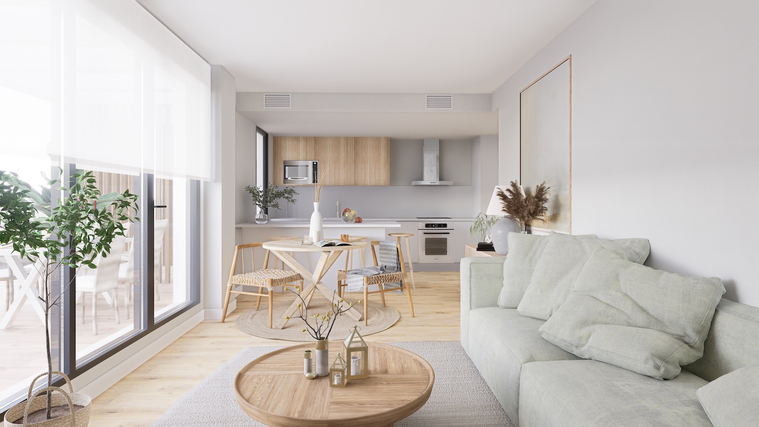 Salón-comedor de planta abierta con sofá verde claro, mesa de centro de madera y comedor con sillas de mimbre. Cocina moderna con armarios de madera clara y electrodomésticos integrados, bañada en luz natural.