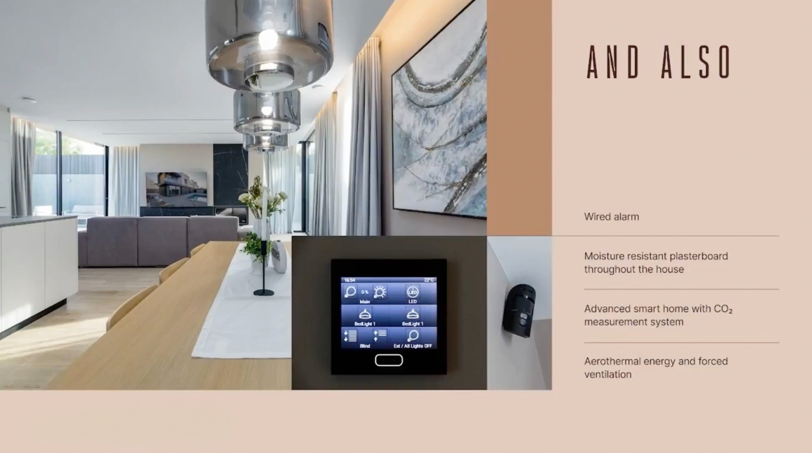 Salón-comedor de diseño abierto con mesa de madera, lámparas colgantes y panel de control domótico integrado, junto a un sensor de seguridad. Salón-comedor de diseño abierto con mesa de madera, lámparas colgantes y panel de control domótico integrado, junto a un sensor de seguridad.