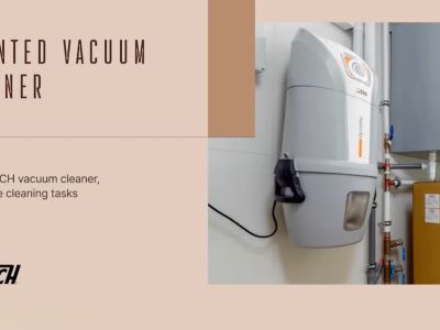 Unidad de aspiración centralizada SACH Dynamic, montada en pared junto a las instalaciones técnicas, para una limpieza eficiente.