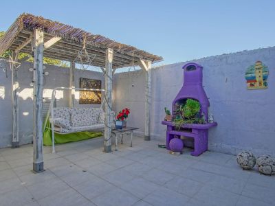 Terraza privada con pérgola
