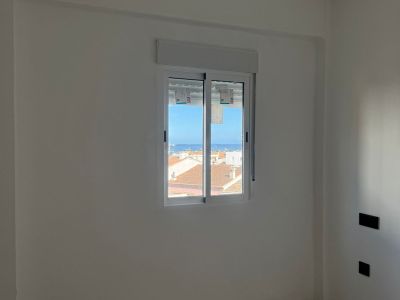 Dormitorio con vistas al mar