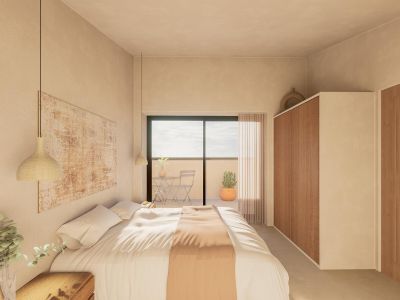 Dormitorio con acceso a terraza