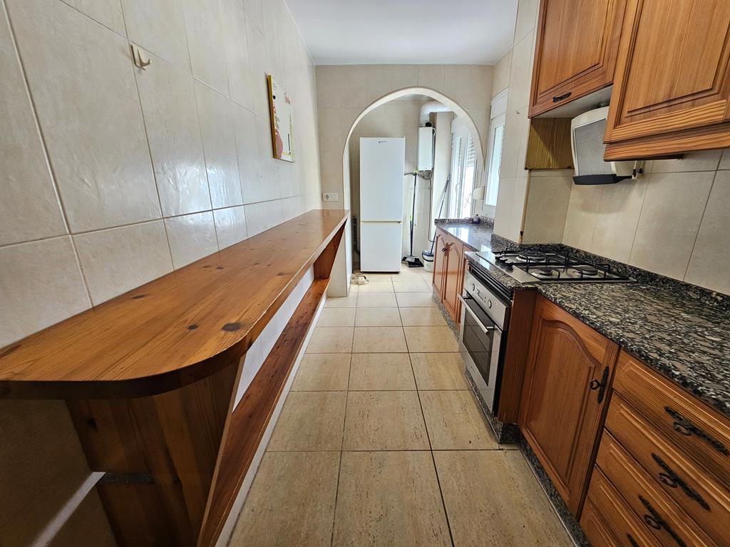 Cocina con lavadero