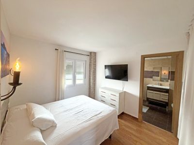 Dormitorio principal con baño en suite
