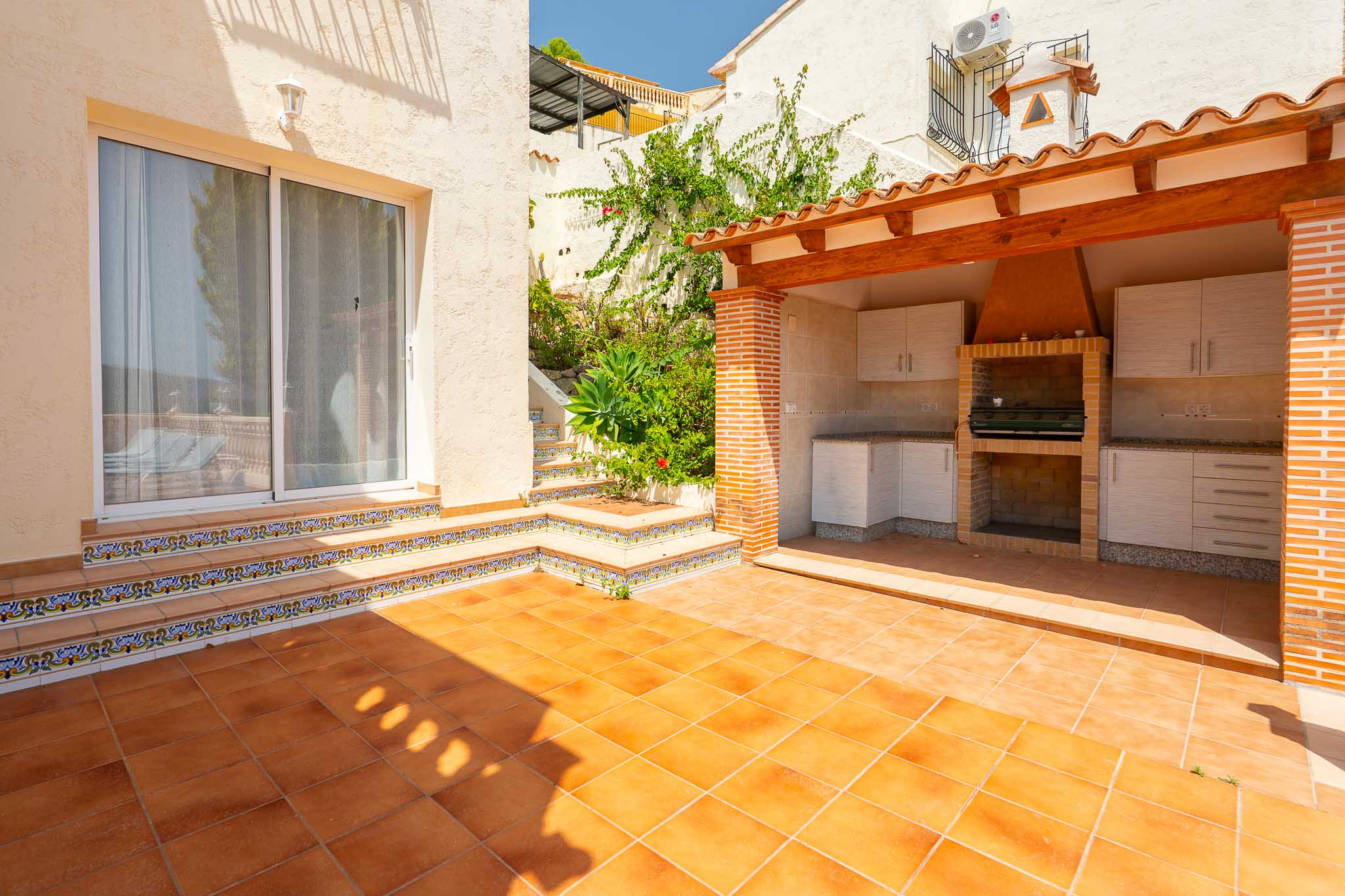 Terraza con cocina de verano