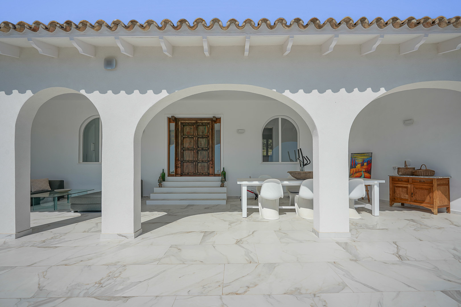 Terraza cubierta con arcos