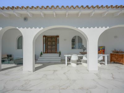 Terraza cubierta con arcos