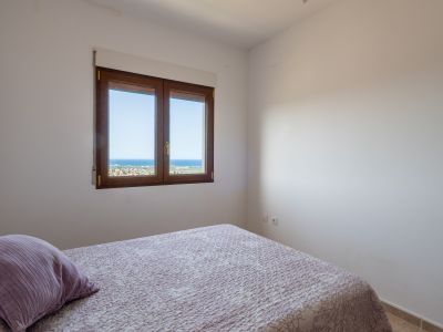 Dormitorio con vistas al mar