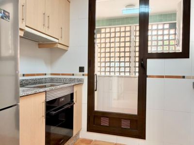 Cocina con acceso al lavadero