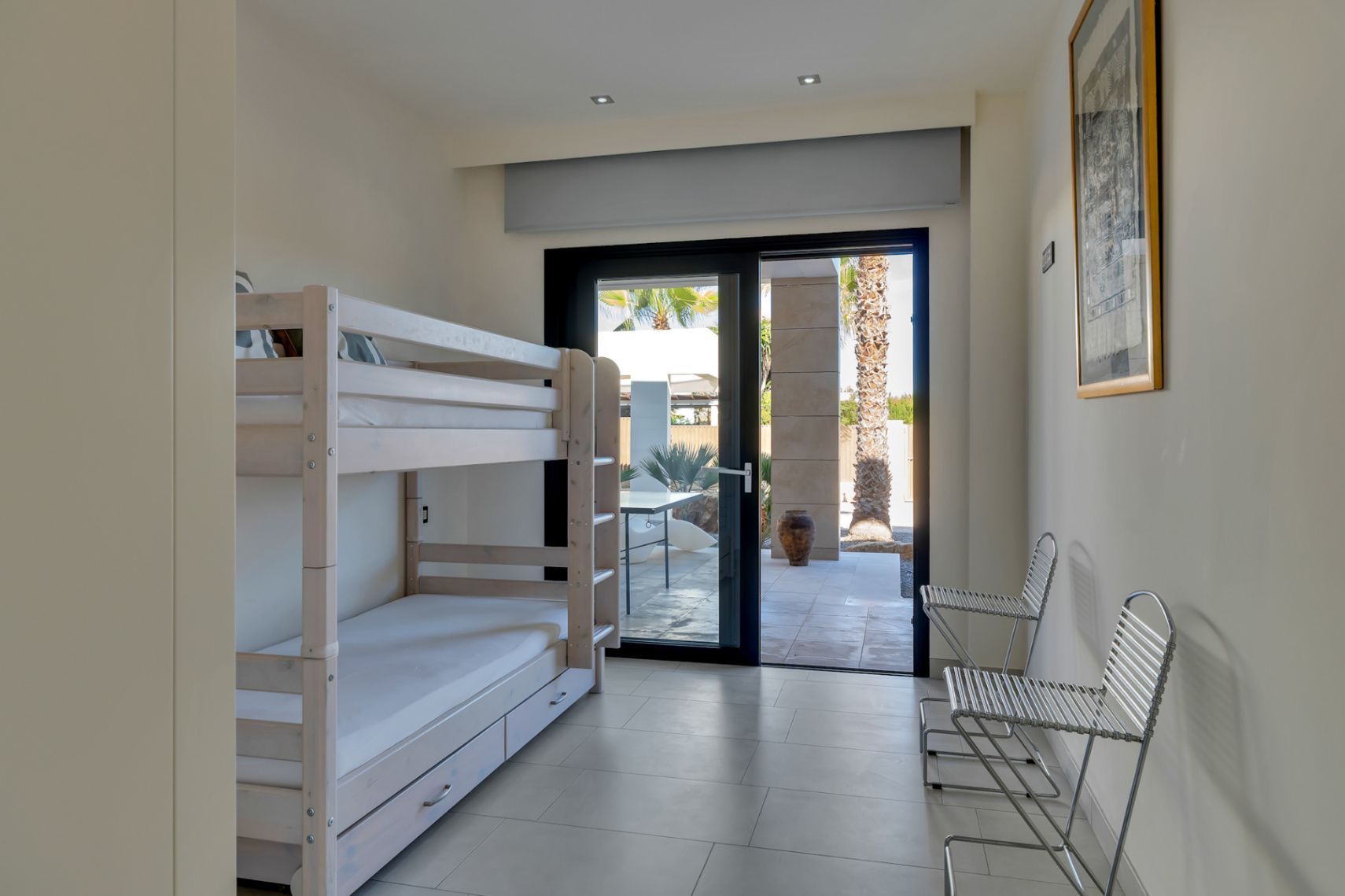 Dormitorio con acceso a la terraza