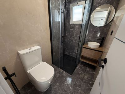 Cuarto de baño con ducha