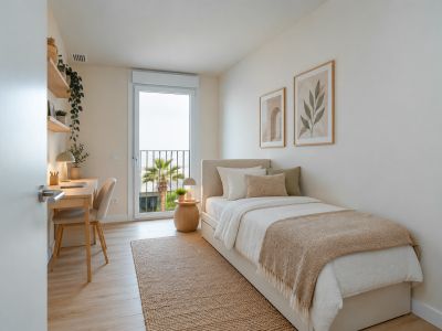 Dormitorio con balcón