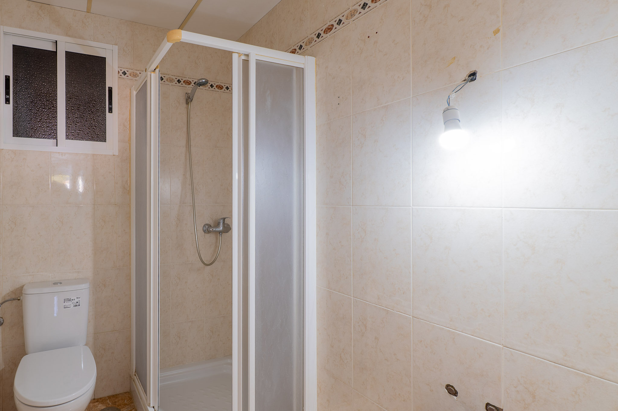 Cuarto de baño con ducha