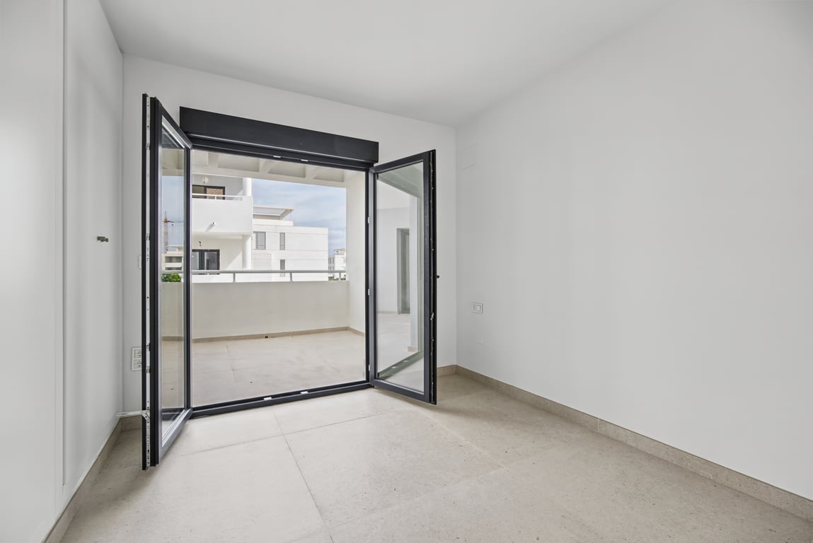 Dormitorio con salida a la terraza