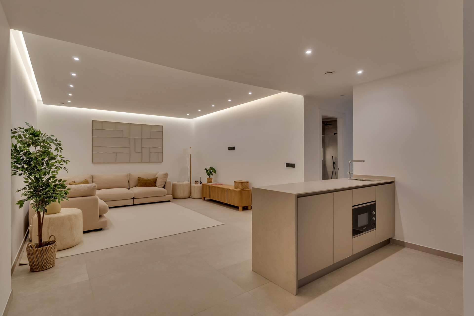 Salón con cocina abierta