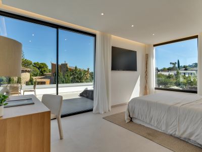 Dormitorio con terraza