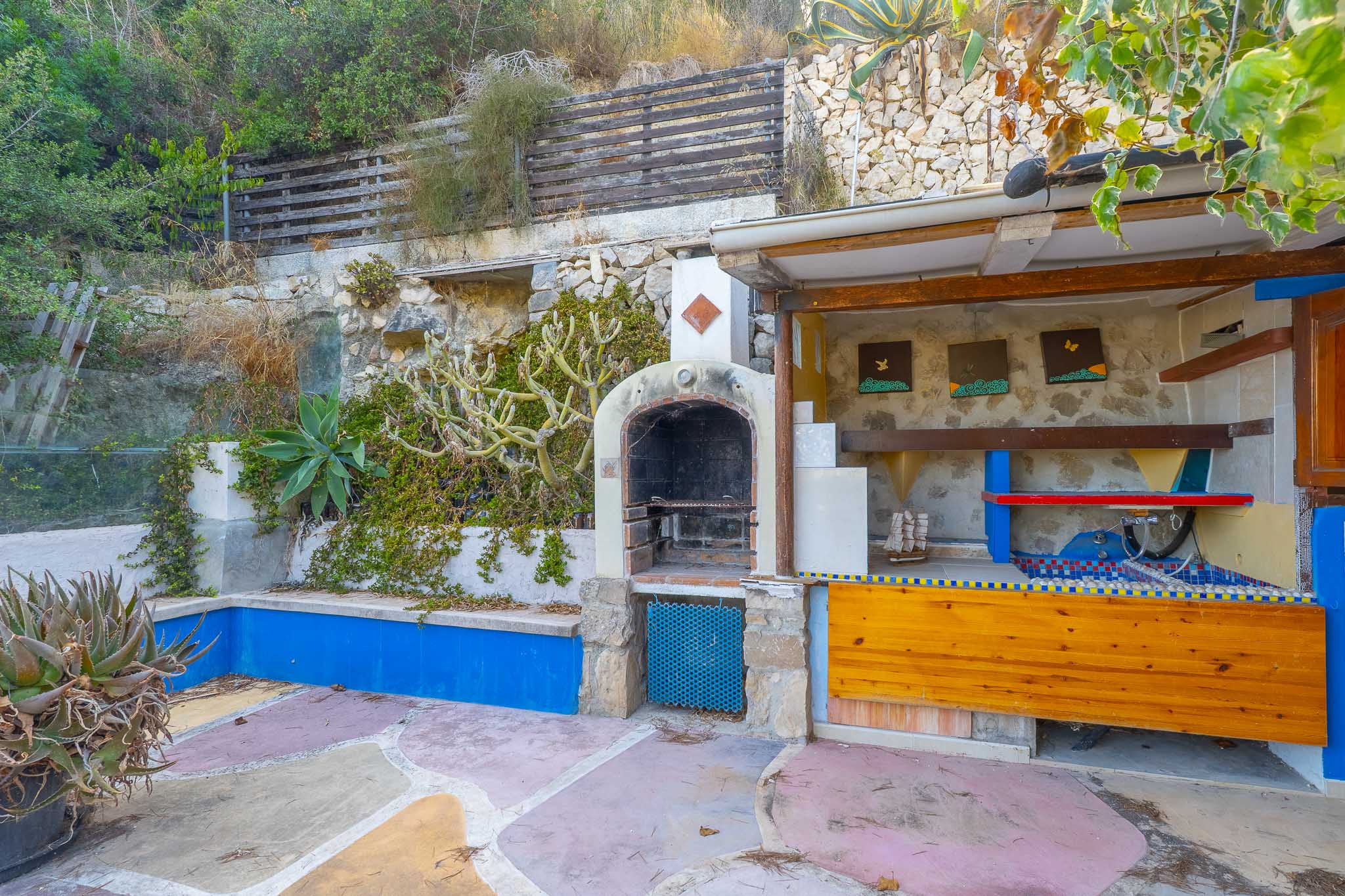 Cocina exterior con barbacoa