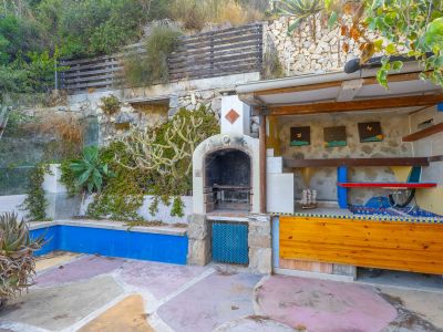 Cocina exterior con barbacoa
