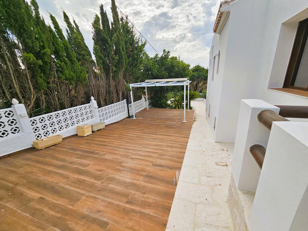 Terraza con pérgola
