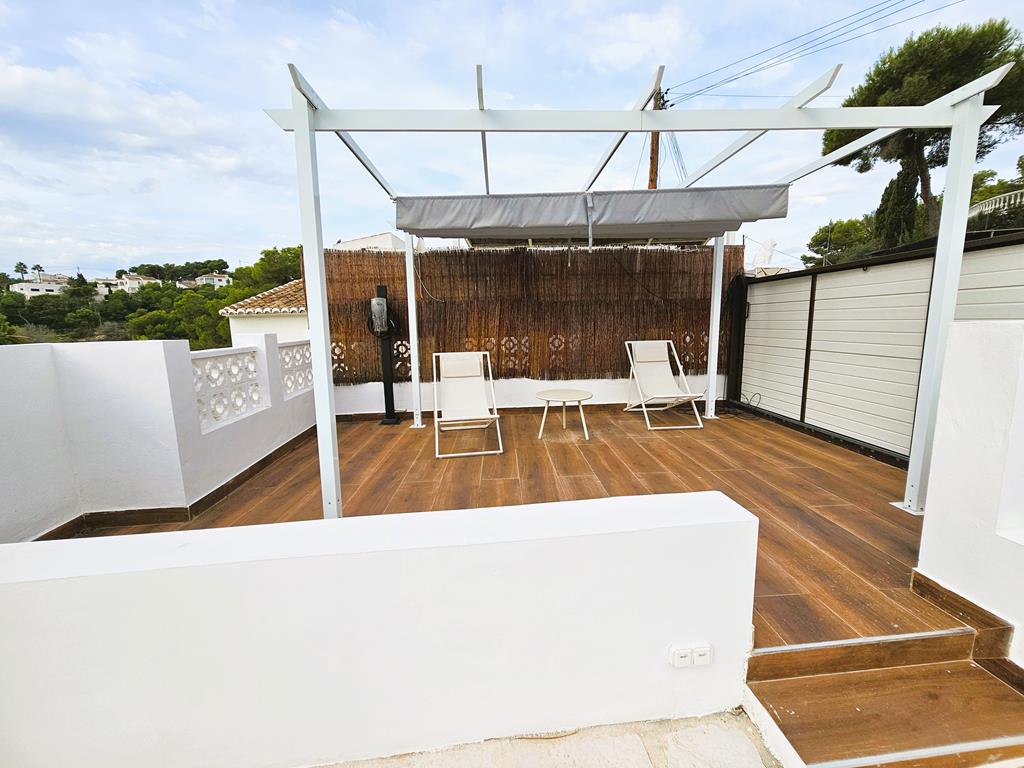 Terraza con pérgola