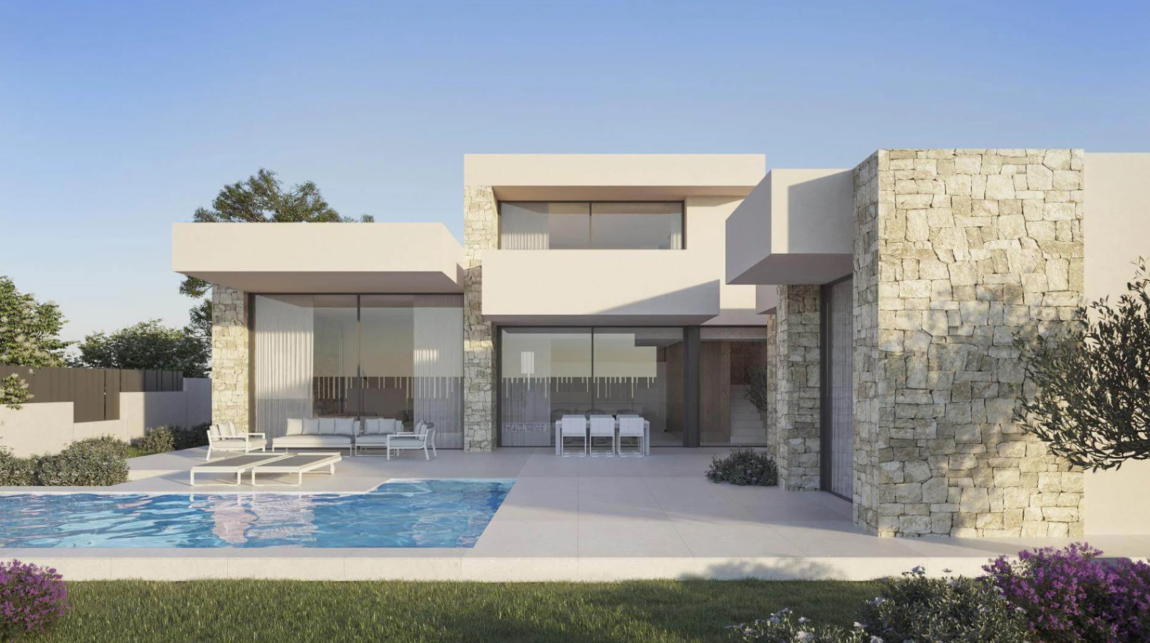 Fachada de villa moderna con muros de piedra natural, piscina integrada y amplia terraza con mobiliario de exterior y ventanales de suelo a techo.