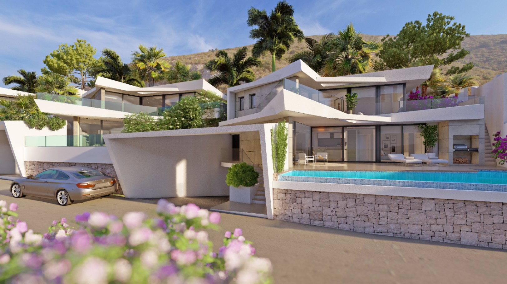 Villa moderna de varios niveles con arquitectura angular blanca, piscina infinita revestida en piedra y terrazas de cristal frente a una ladera con palmeras.