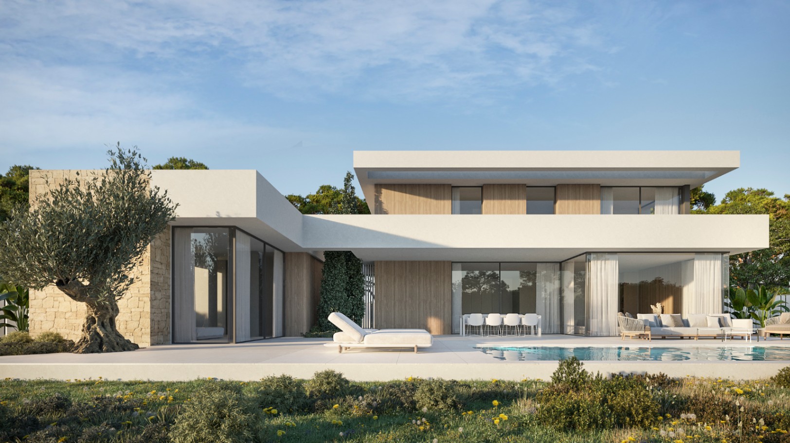 Exterior de villa moderna con fachada blanca, detalles en madera y muro de piedra, que incluye una piscina con solárium, zona de comedor y un olivo.