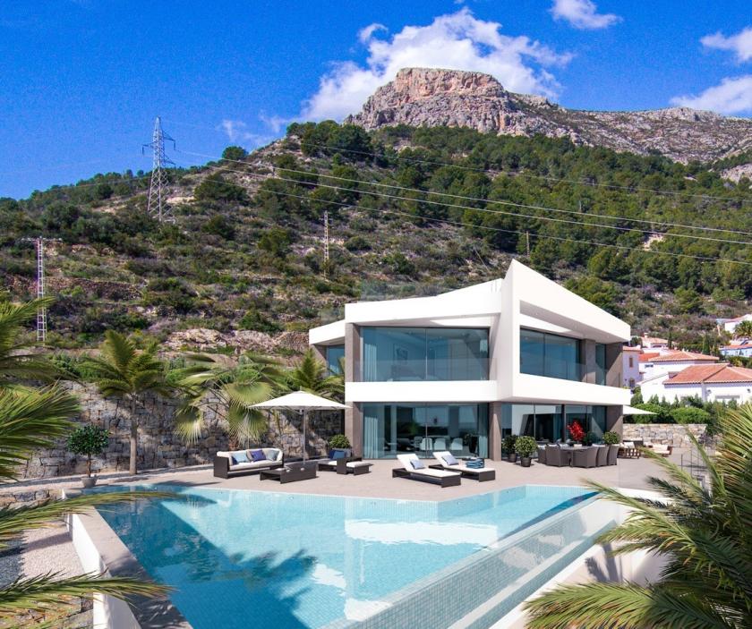 Vista exterior de la villa con piscina infinita y zona de estar, con vistas a la montaña. Vista exterior de la villa con piscina infinita y zona de estar, con vistas a la montaña.
