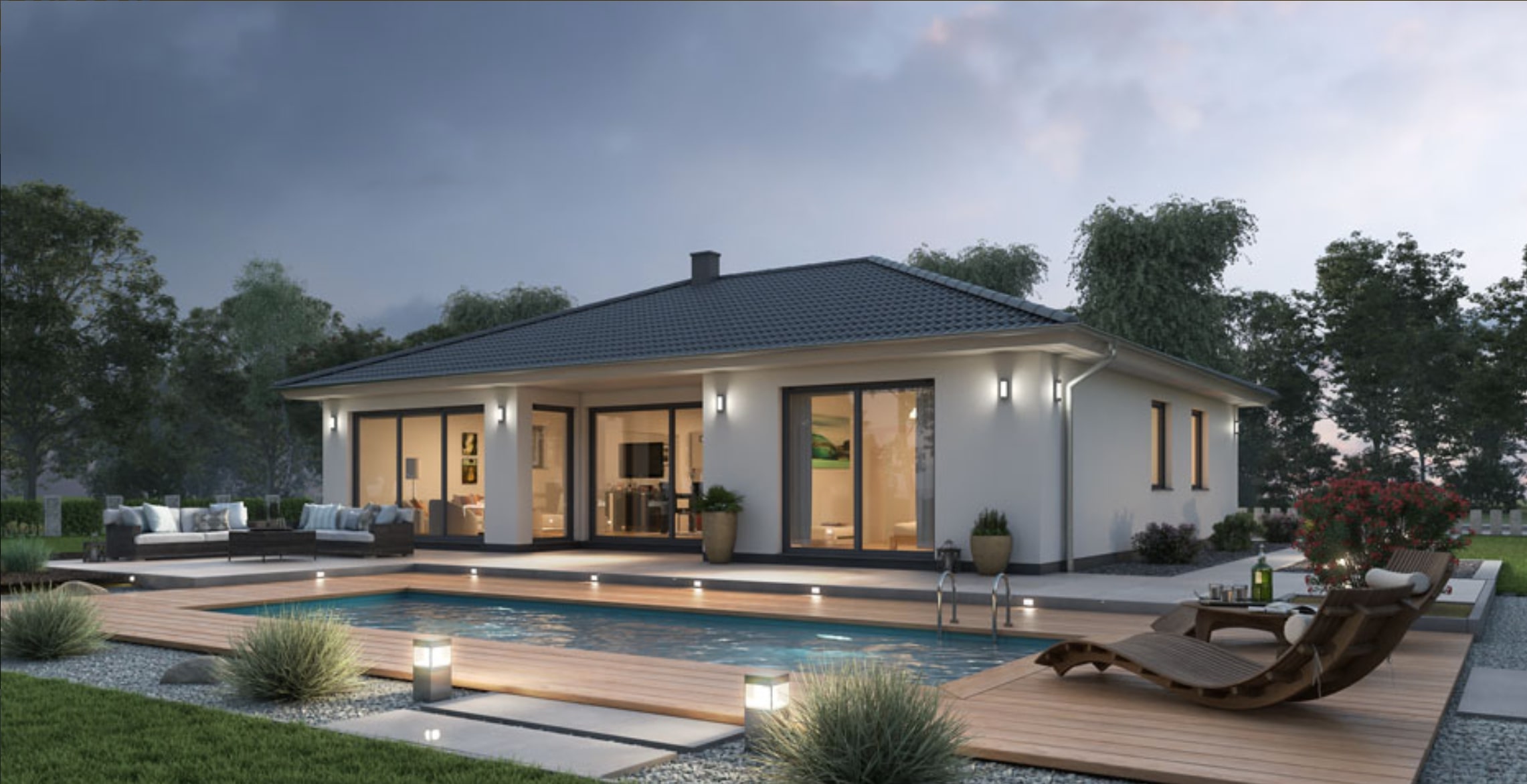 Vista exterior de la villa con piscina privada y terraza de madera, ideal para el relax al aire libre.