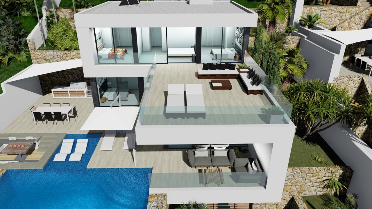 Vista aérea de la villa con piscina azul, terraza con tumbonas y zona de estar exterior.