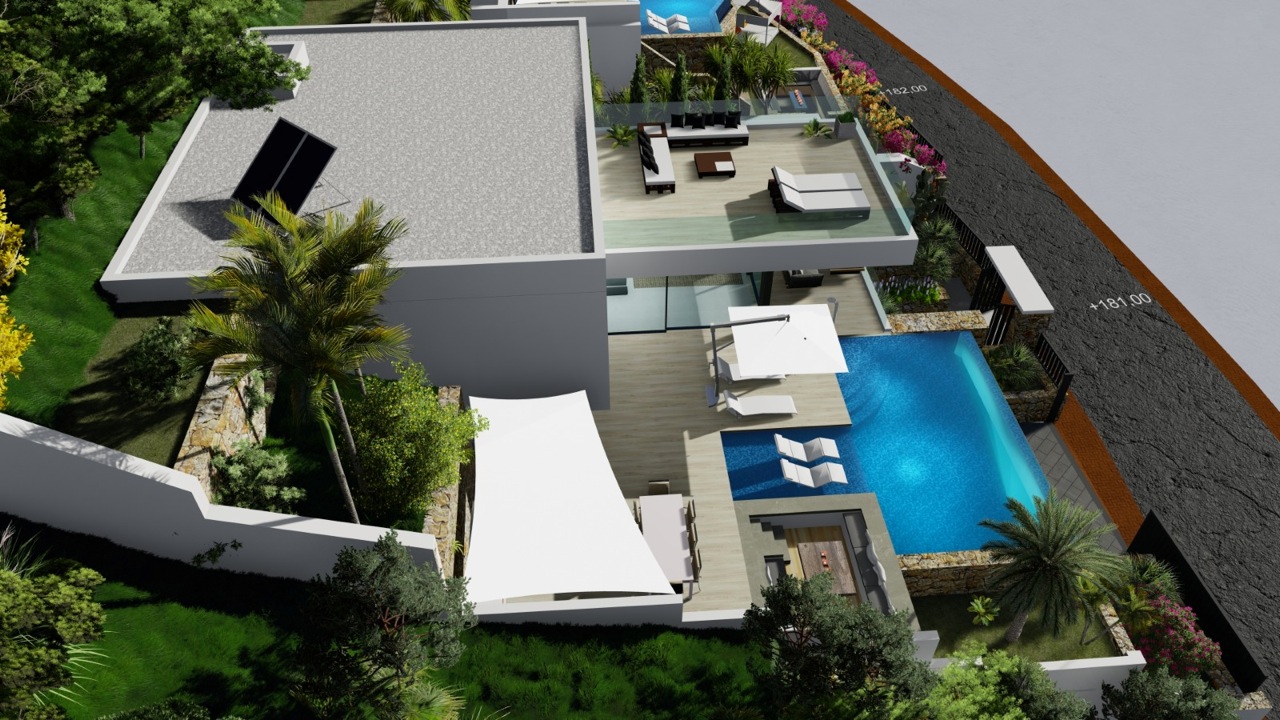 Vista aérea de la villa mostrando piscina infinita, terraza superior con mobiliario y jardín con vegetación.