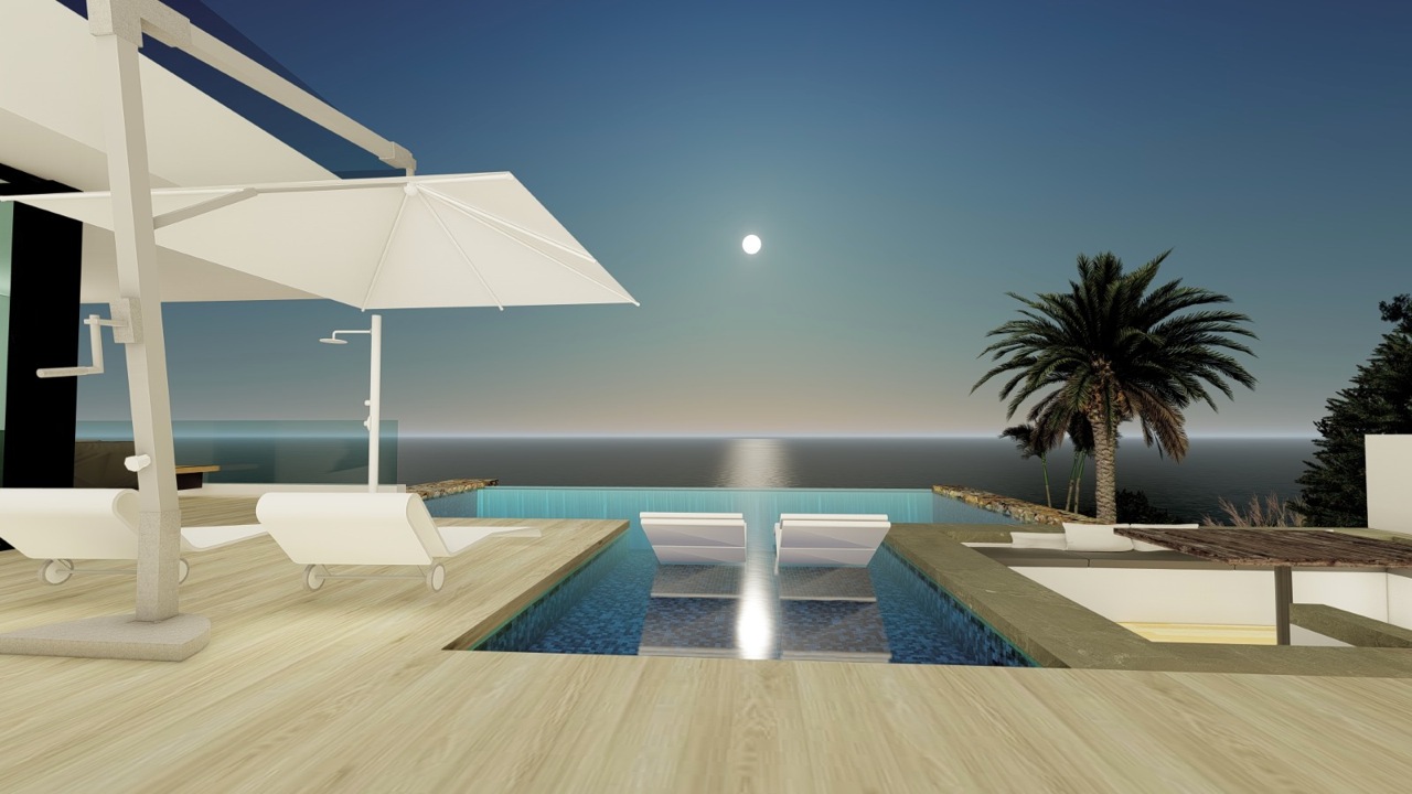 Vista de la piscina infinita con tumbonas sumergidas y sombrilla grande, frente al mar.