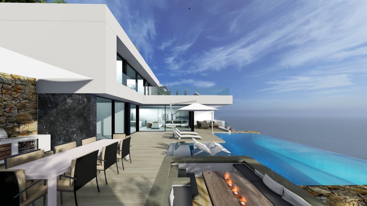 Vista de la terraza con piscina infinita, zona de comedor exterior y vistas al mar.