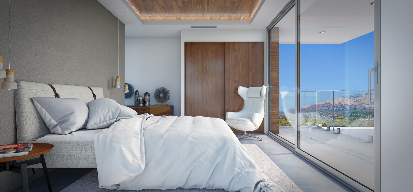 Dormitorio moderno con armarios empotrados de madera, techo con detalles en madera y grandes ventanales que dan acceso a una terraza privada con vistas a la montaña.