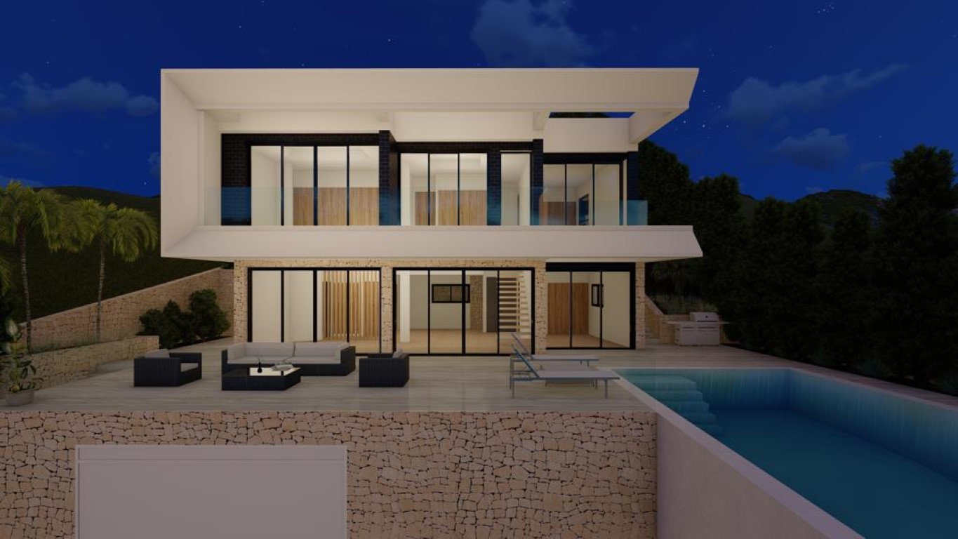Fachada posterior iluminada con piscina infinita, muros de piedra seca y amplios ventanales que integran el salón exterior con el diseño interior de madera y cristal.