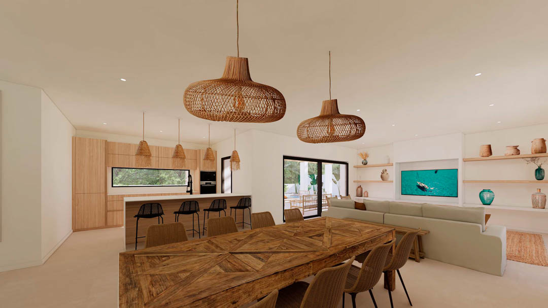 Salón-comedor diáfano de estilo ibicenco con mesa de madera rústica, lámparas de fibras naturales y cocina integrada con isla y acabados en madera clara.